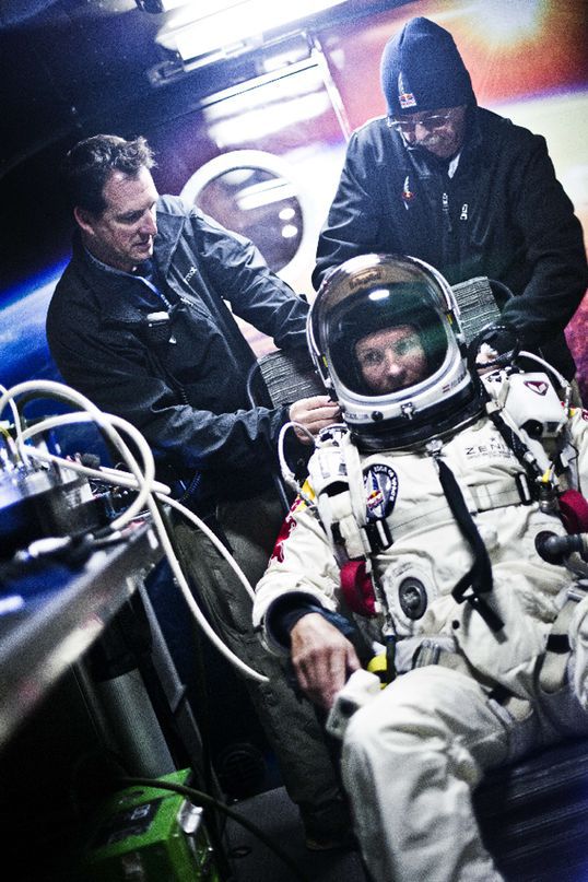 The Red Bull Stratos mission team preps Felix Baumgartnem before heading into the stratosphere. Photo: AFP
