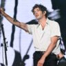 the 1975s controversial act in malaysia and its financial repercussions the 1975 performing 1