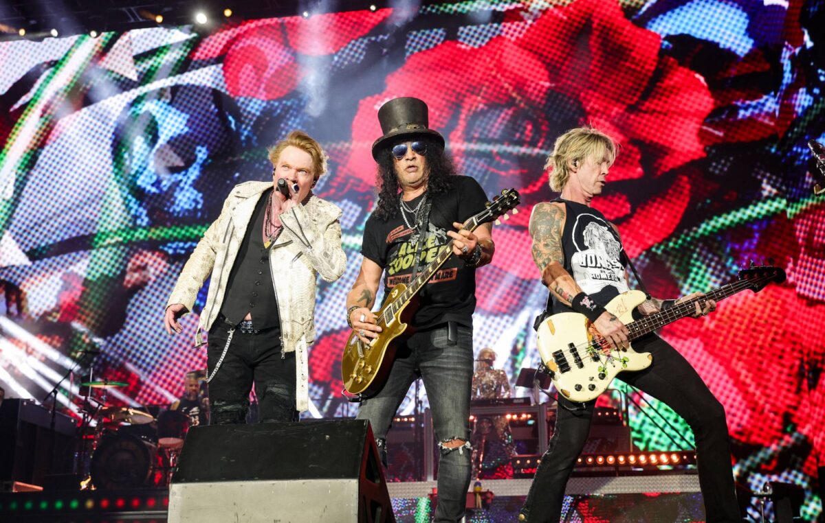 INDIO, CALIFORNIA - OCTOBER 06: (EDITORIAL USE ONLY) (L-R) Axl Rose, Slash, and Duff McKagan of Guns N' Roses perform onstage during the Power Trip music festival at Empire Polo Club on October 06, 2023 in Indio, California. (Photo by Kevin Mazur/Getty Images for Power Trip)